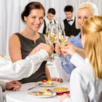 Making it a Celebration remains tax deductible - Business partners toast champange