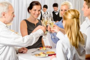 Making it a Celebration remains tax deductible - Business partners toast champange