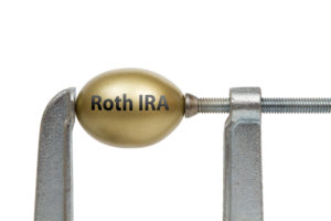 Golden Egg in Metal Clamp - Roth IRA Retirement Investment Plan Blog for Stableford
