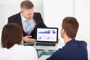 Advisor explaining financial plan to couple - how to find a financial advisor Stableford Capital blog