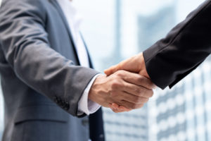 family office partner shaking hands stableford capital