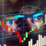 market commentary August 2020 - Nasdaq with close up of stock broker eyes looking at screen-web