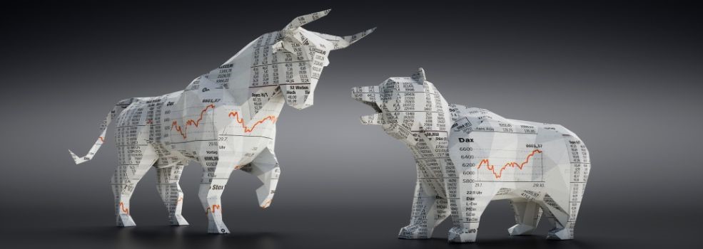 A bull and bear made out of paper with stock symbols on it on a black background